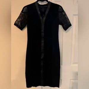 Elie Tahari black dress with short mesh sleeves and suede & leather accents